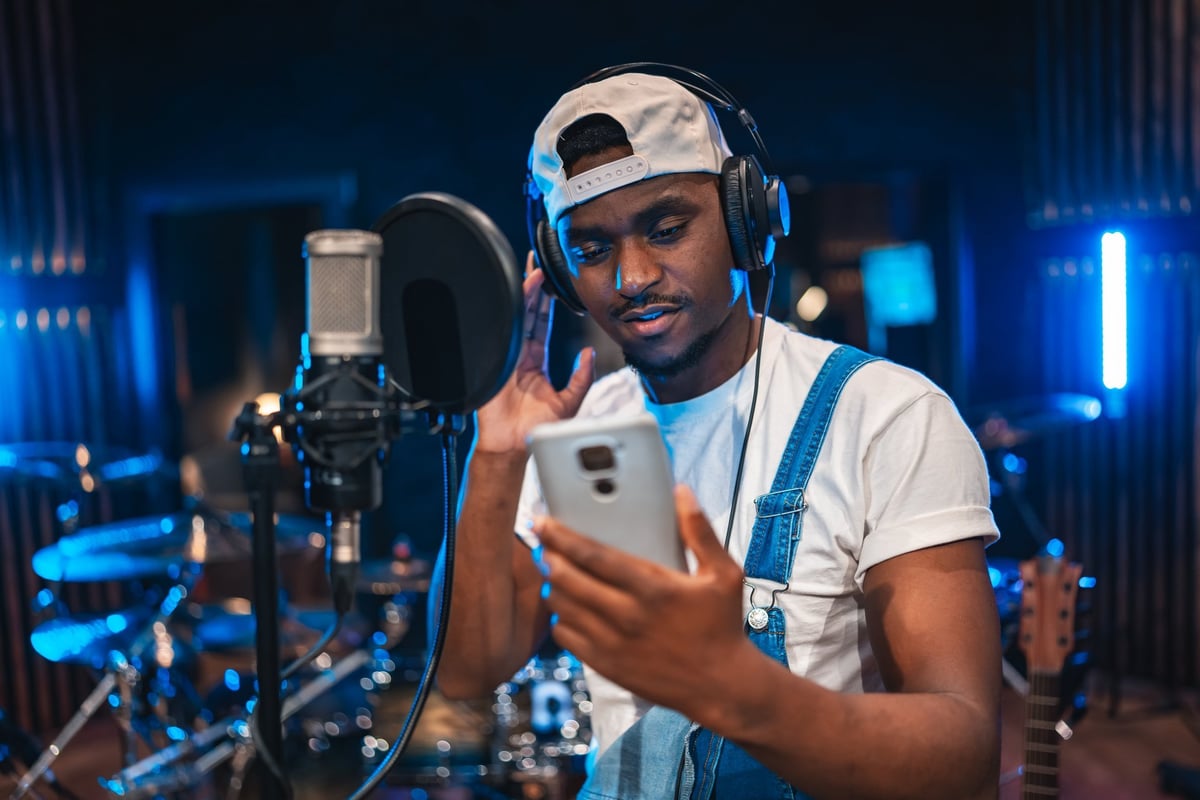 J. Money, Neon Beams artist and songwriter, recording in a professional studio